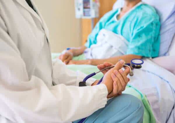 Hospital-associated thrombosis is a blood clot that occurs as a result of hospitalization