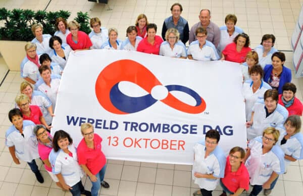 group-holding-wtd-banner World Thrombosis Day symbol was designed by a patient to raise awarenss of blood clots