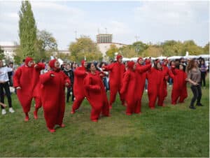 group-in-red-costume-participating-in-an-activity