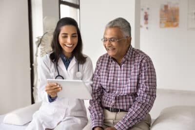 Doctor discussing blood clot diagnosis with a patient